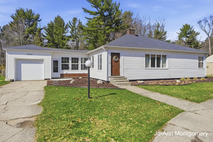 Welcome to this 3-bedroom, 1.5-bath home, set on a spacious - Beach Home for sale in Norton Shores, Michigan on Beachhouse.com
