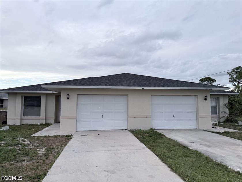 This well-maintained, income-producing duplex in the growing - Beach Home for sale in Lehigh Acres, Florida on Beachhouse.com