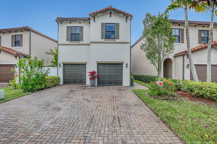 Built in 2019, this stunning 4-bedroom, 2.5-bathroom lakefront - Beach Home for sale in Riviera Beach, Florida on Beachhouse.com