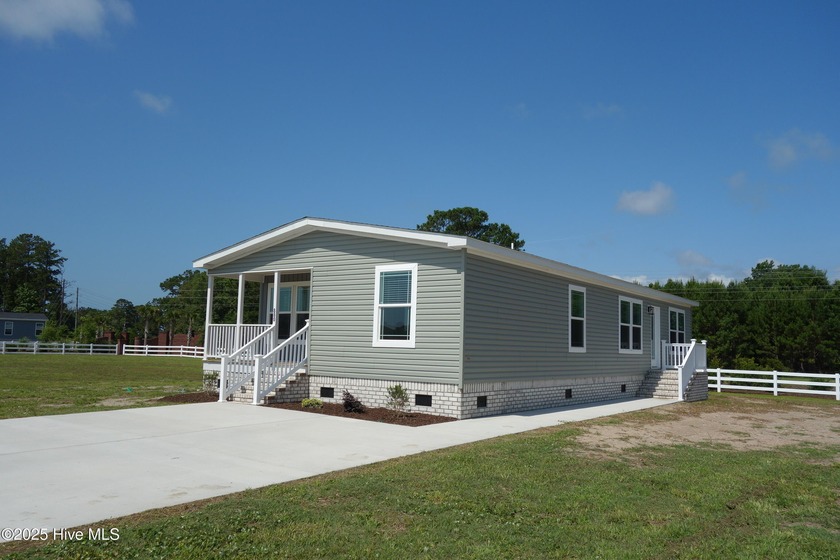 Charming New Doublewide - Coastal Living at Its Best! This newly - Beach Home for sale in Calabash, North Carolina on Beachhouse.com
