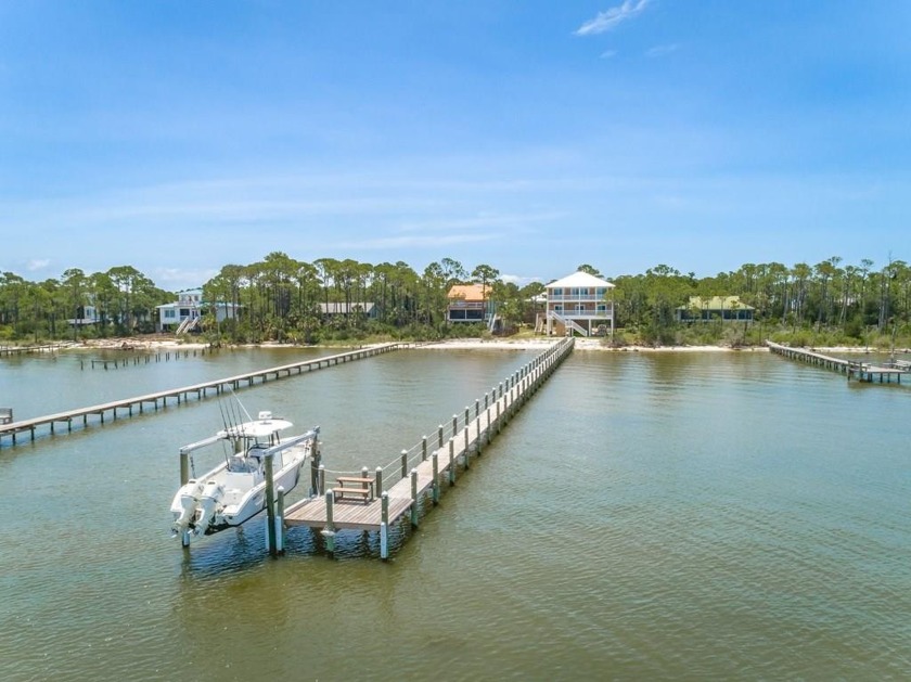 Everything you could want in a bayfront dream beach home. Sit on - Beach Home for sale in St. George Island, Florida on Beachhouse.com