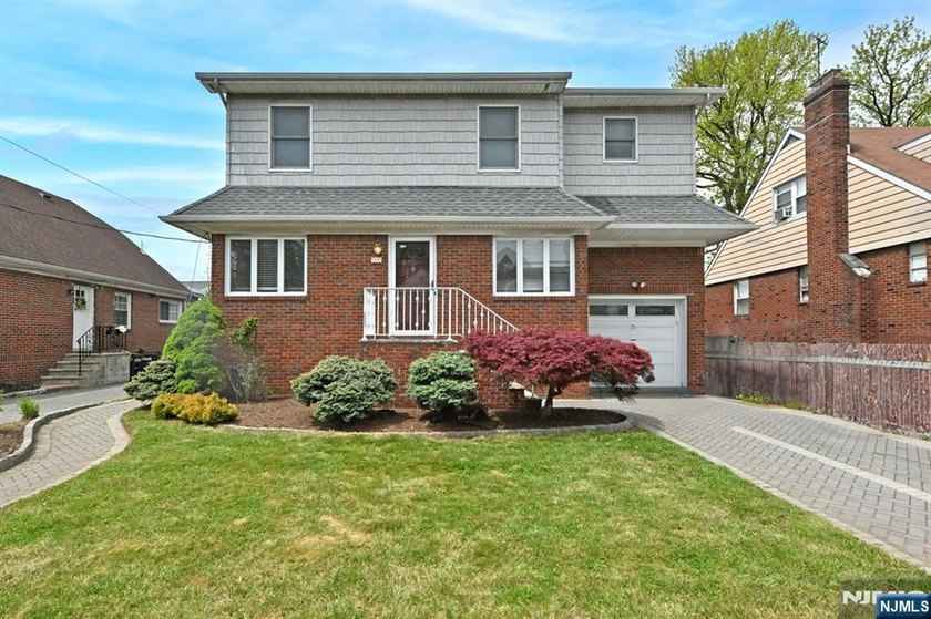 This deceptively spacious, stately brick-front home blends charm - Beach Home for sale in Fort Lee, New Jersey on Beachhouse.com
