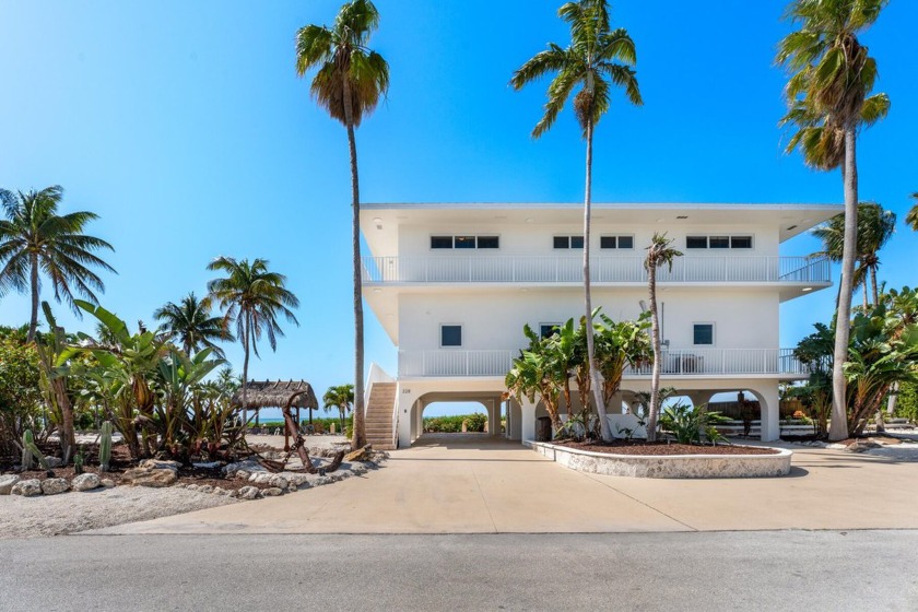 Nestled on the ocean, this exceptional estate on Plantation - Beach Home for sale in Duck Key, Florida on Beachhouse.com
