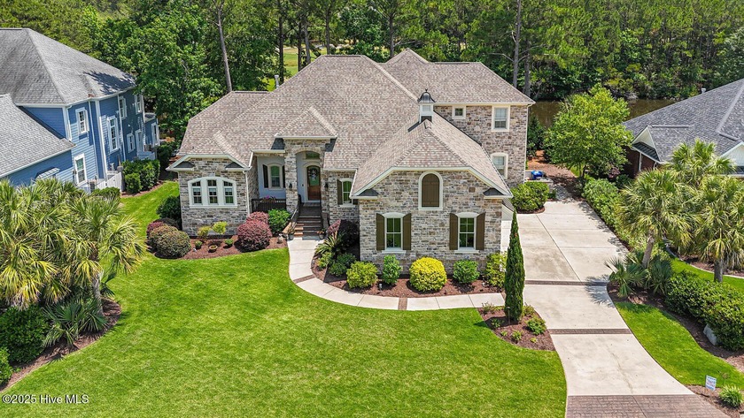 Stunning one-of-a-kind custom stone beauty with pond/golf course - Beach Home for sale in Ocean Isle Beach, North Carolina on Beachhouse.com