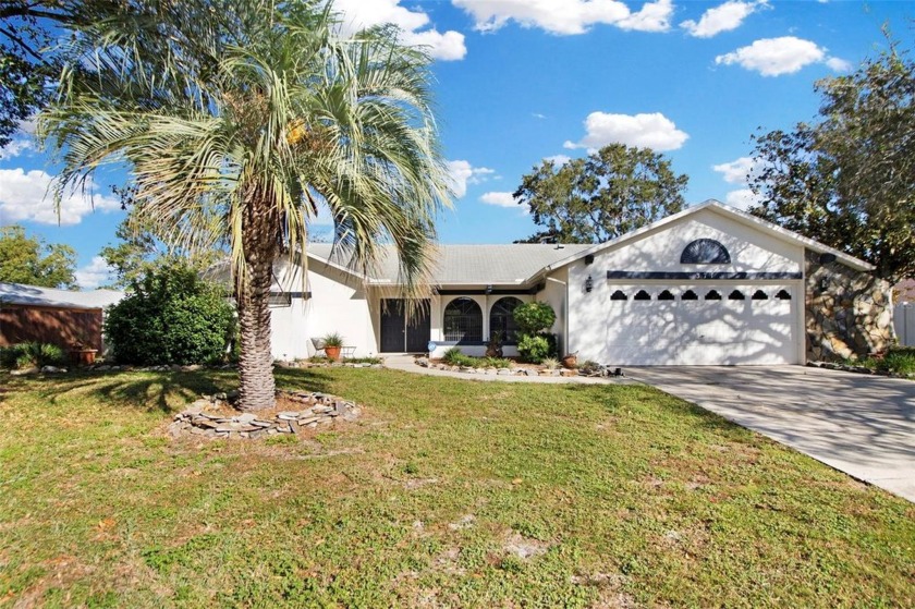 This single level gem is located on a quiet cul-de-sac, and - Beach Home for sale in Spring Hill, Florida on Beachhouse.com