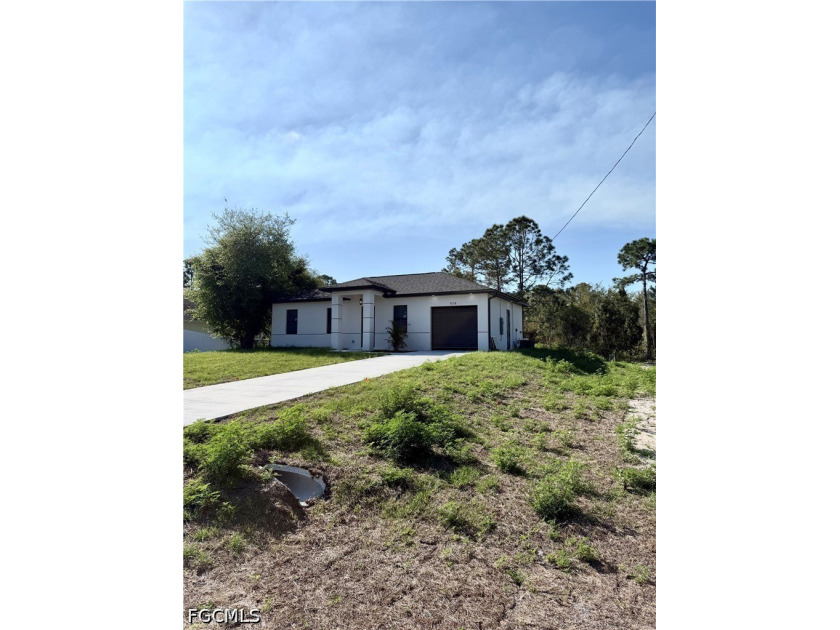 Location, Location, Beautiful warm Home with 3 bed and 2 Bath - Beach Home for sale in Lehigh Acres, Florida on Beachhouse.com