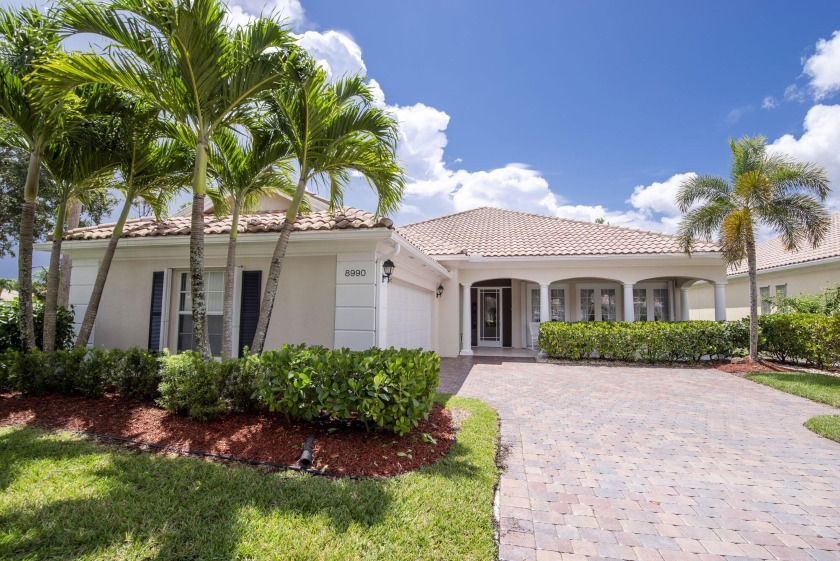 Discover the ultimate in lakefront living with this beautifully - Beach Home for sale in Palm Beach Gardens, Florida on Beachhouse.com