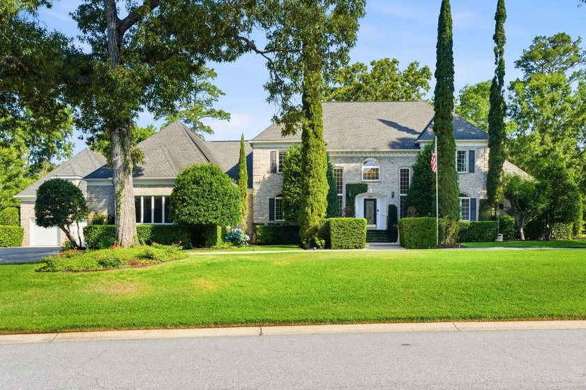 This stately home in Coosaw Creek Country Club is located on a - Beach Home for sale in North Charleston, South Carolina on Beachhouse.com