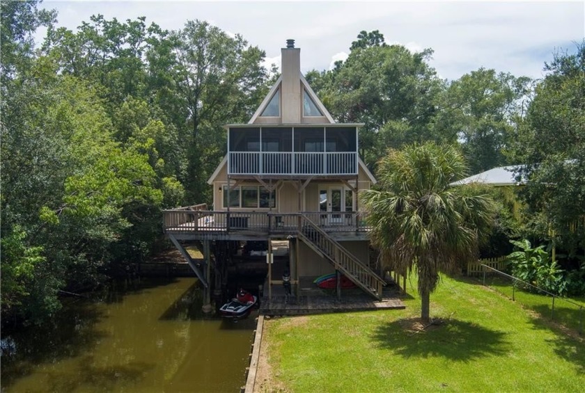 Check out this charming 3 bedroom, 2 bathroom A-Frame home - Beach Home for sale in Theodore, Alabama on Beachhouse.com