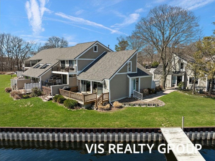 Waterfront Condo with Breathtaking Views and Resort-Style - Beach Condo for sale in Spring Lake, Michigan on Beachhouse.com