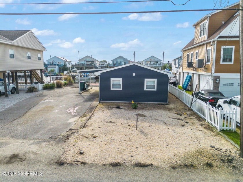 Seize the incredible opportunity to own a waterfront home in the - Beach Home for sale in Little Egg Harbor, New Jersey on Beachhouse.com