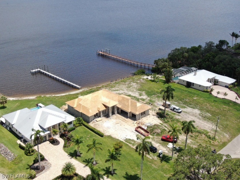 RARE OPPORTUNITY DIRECT RIVERFRONT: *Under Construction* on - Beach Home for sale in North Fort Myers, Florida on Beachhouse.com