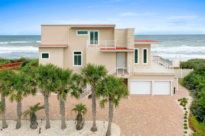 HELLO PARADISE!! This MASTERPIECE of a home is what dreams are - Beach Home for sale in Flagler Beach, Florida on Beachhouse.com