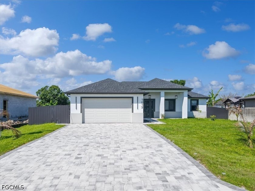 Step into a level of modern luxury rarely found in Lehigh - Beach Home for sale in Lehigh Acres, Florida on Beachhouse.com