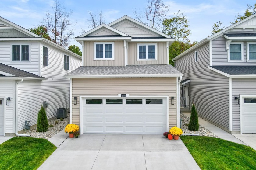Welcome to the hottest new development in Norton Shores! This - Beach Home for sale in Norton Shores, Michigan on Beachhouse.com