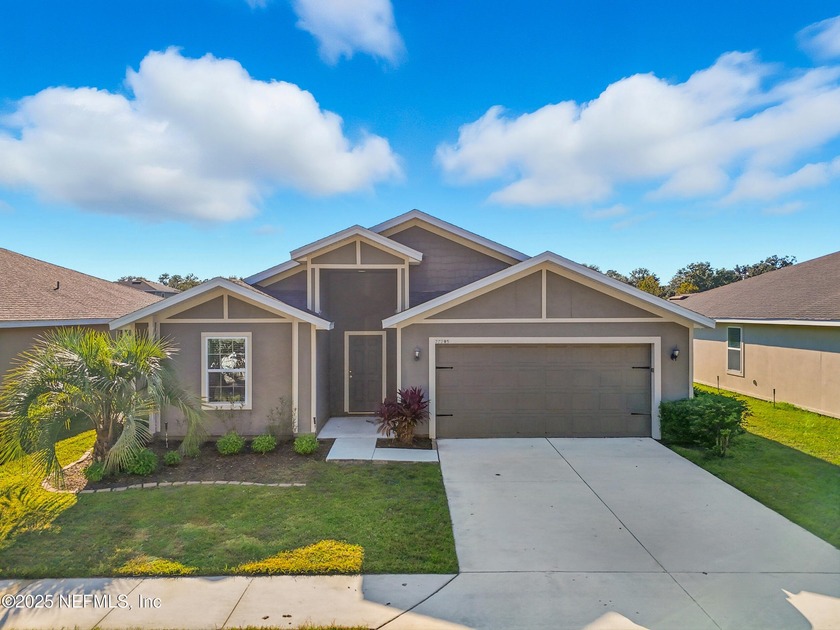 Located in the desirable Lumber Creek community in Yulee, this - Beach Home for sale in Yulee, Florida on Beachhouse.com