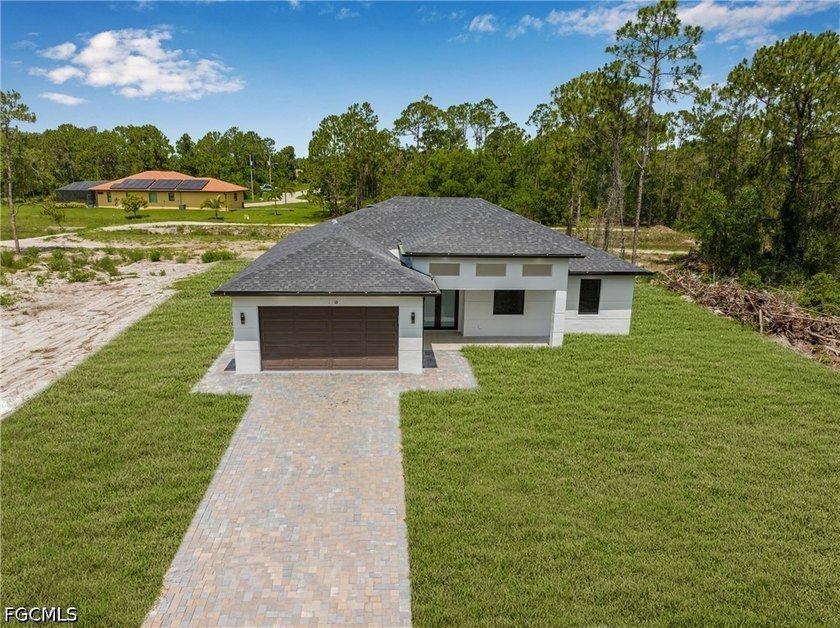 Beautiful New Construction Home in Lehigh Acres Discover this - Beach Home for sale in Lehigh Acres, Florida on Beachhouse.com