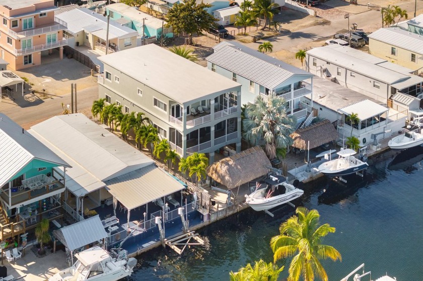 Coastal elegance meets boater's paradise in this modern - Beach Home for sale in Key Largo, Florida on Beachhouse.com