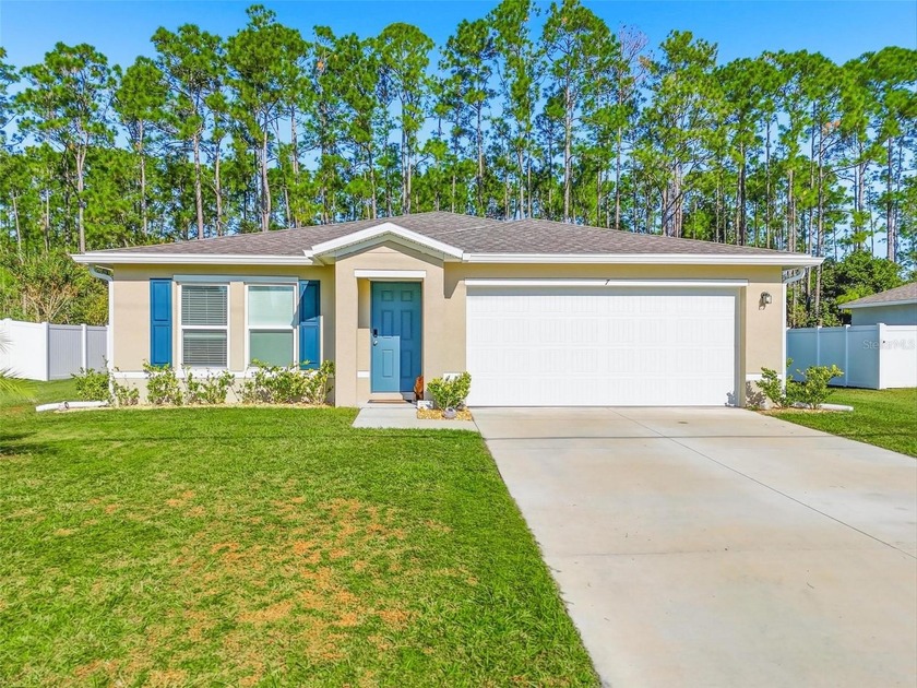 Stunning 2024-Built 4-Bedroom Home in Desirable Seminole Woods! - Beach Home for sale in Palm Coast, Florida on Beachhouse.com
