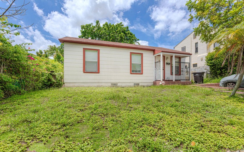 Don't miss this charming 3-bedroom, 1-bath home located on a - Beach Home for sale in West Palm Beach, Florida on Beachhouse.com