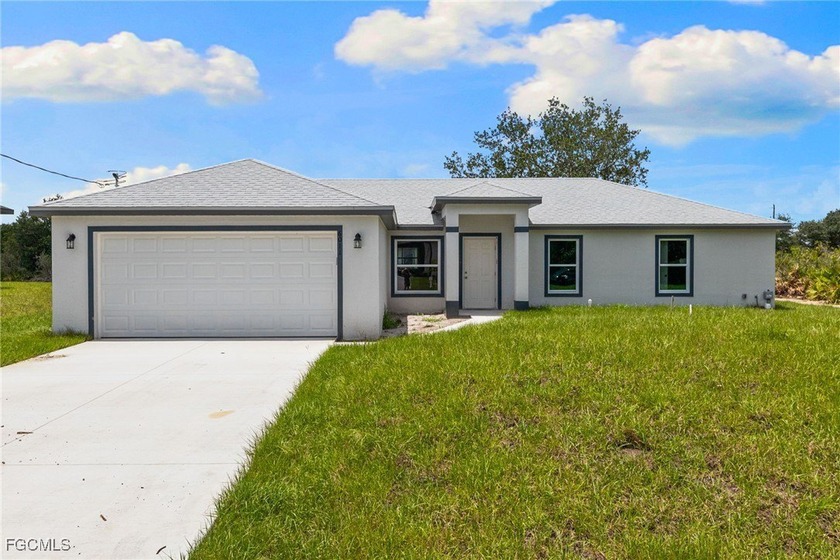 Seller will pay towards closing costs! NEW CONSTRUCTION WITH - Beach Home for sale in Lehigh Acres, Florida on Beachhouse.com