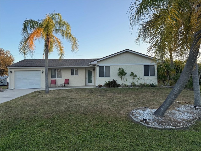 NEW IMPROVED PRICE!! This cozy 3-bedroom, 2 bath home with a one - Beach Home for sale in Englewood, Florida on Beachhouse.com