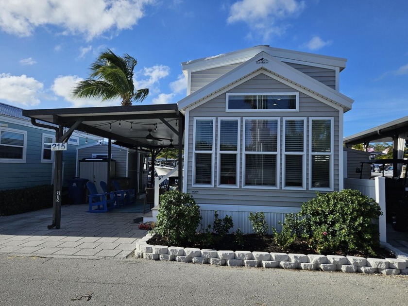Stunning canal front Calusa property includes a 2022 Elevation - Beach Home for sale in Key Largo, Florida on Beachhouse.com
