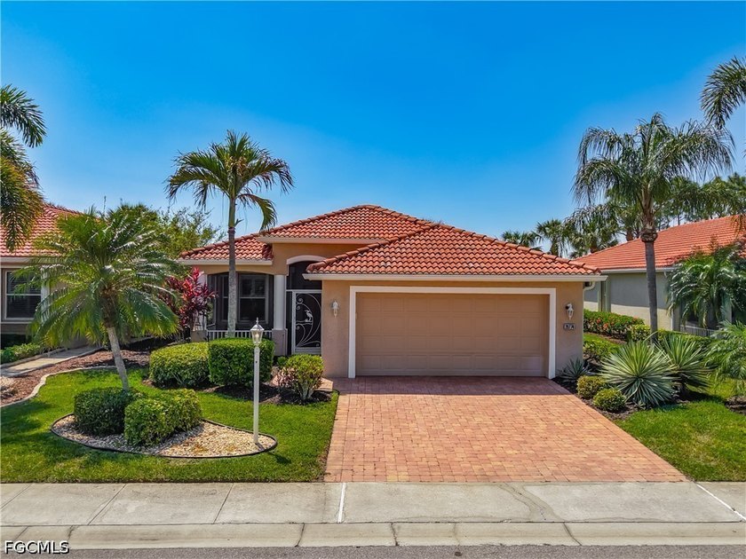 Nestled in the desirable Fairways section of HERONS GLEN COUNTRY - Beach Home for sale in North Fort Myers, Florida on Beachhouse.com
