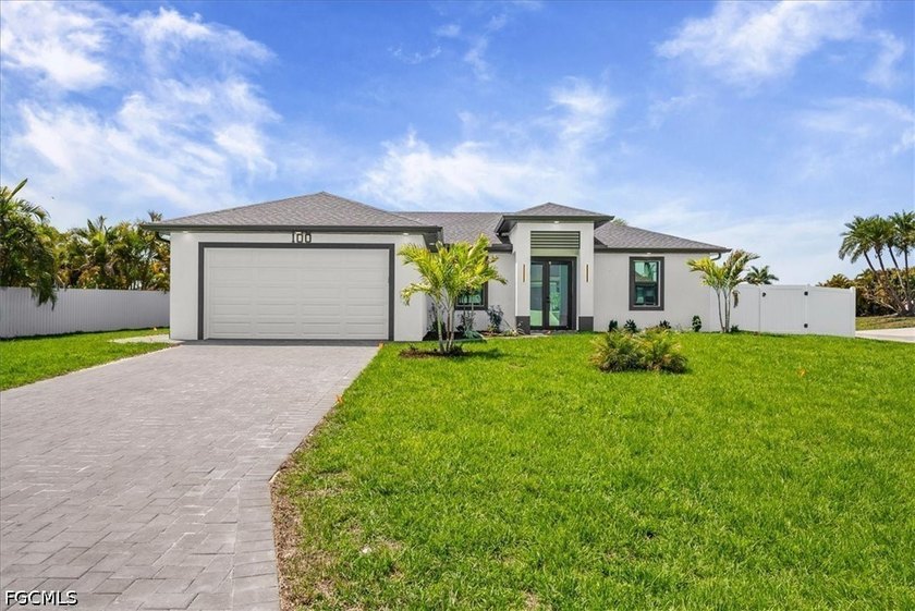 Welcome to this stunning new construction home, where modern - Beach Home for sale in Cape Coral, Florida on Beachhouse.com
