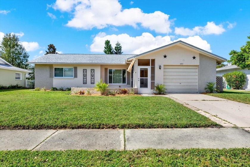 Stunning Two-Bedroom Home in Premier 55+ Golf Course Community! - Beach Home for sale in Palm Harbor, Florida on Beachhouse.com