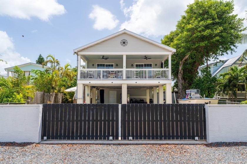 Discover a beautifully updated residence boasting three spacious - Beach Home for sale in Big Coppitt, Florida on Beachhouse.com