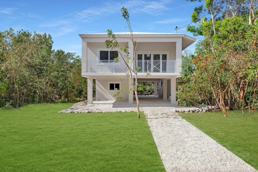 Welcome to your dream home in Key Largo in exclusive Riviera - Beach Home for sale in Key Largo, Florida on Beachhouse.com
