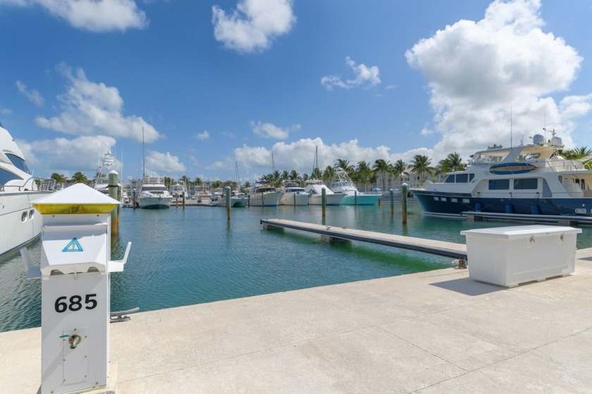 This highly desirable 80' premium live-aboard wet slip offers - Beach Lot for sale in Stock Island, Florida on Beachhouse.com