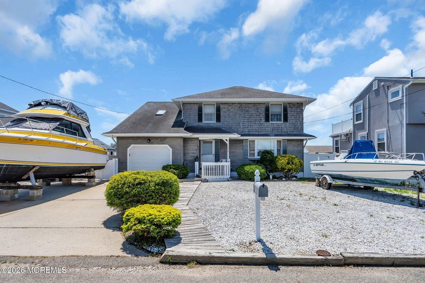 This structurally sound custom home sits on a deep water lagoon - Beach Home for sale in Bayville, New Jersey on Beachhouse.com