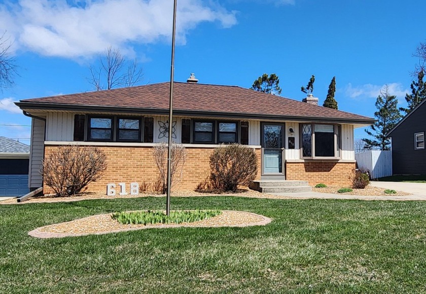 This one is sure to impress! Meticulously cared for & - Beach Home for sale in South Milwaukee, Wisconsin on Beachhouse.com