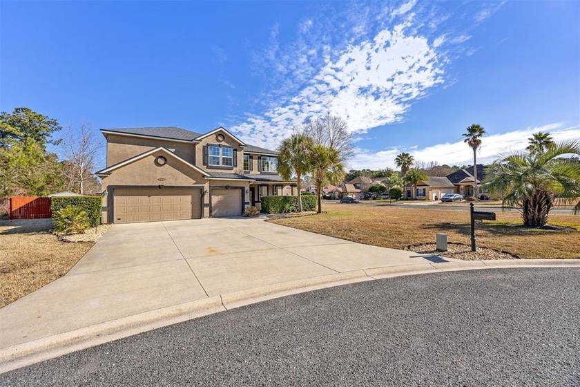 Step into this impressive 4,075-square-foot, two-story home with - Beach Home for sale in Yulee, Florida on Beachhouse.com
