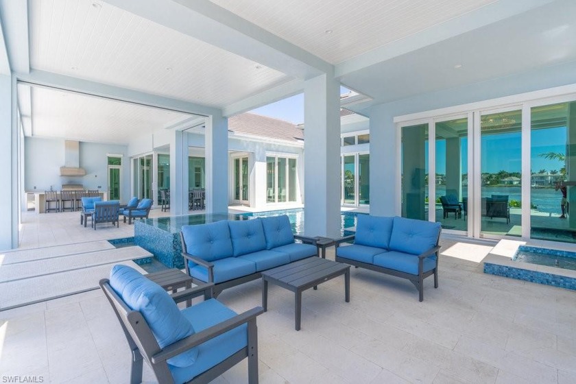 Enjoy Naples Bay living in this stunning home! *Without light - Beach Home for sale in Naples, Florida on Beachhouse.com