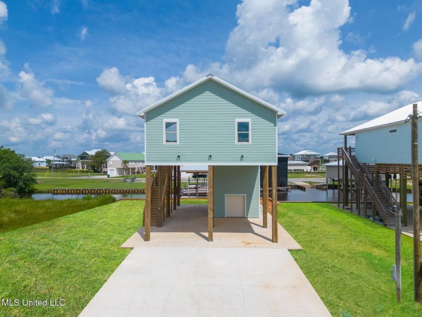 Turnkey custom waterfront oasis. Welcome to Bay Saint Louis and - Beach Home for sale in Bay Saint Louis, Mississippi on Beachhouse.com