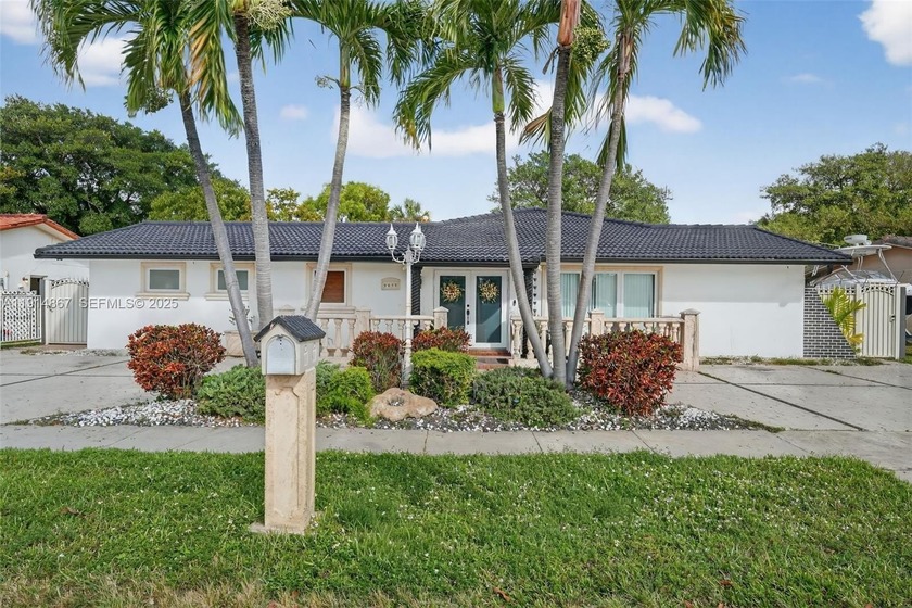 This beautiful single-story home in the heart of Miami features - Beach Home for sale in Miami, Florida on Beachhouse.com