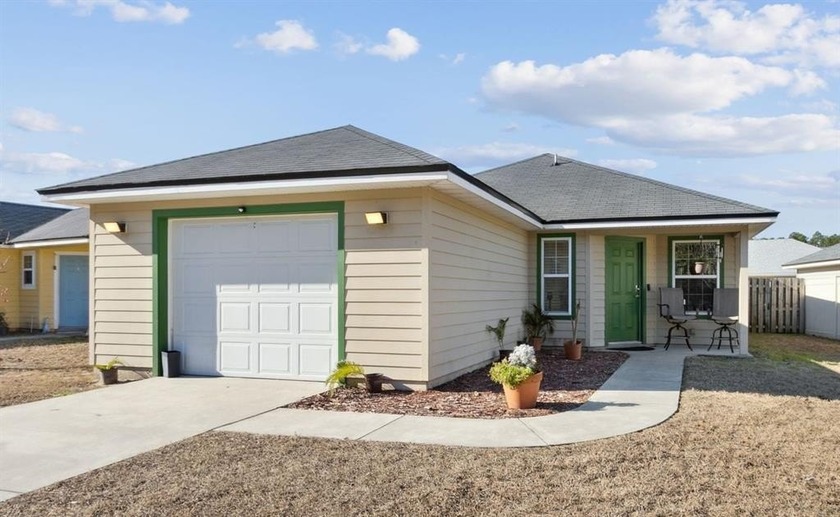 Located on a quiet street in a highly desirable area, this - Beach Home for sale in Yulee, Florida on Beachhouse.com