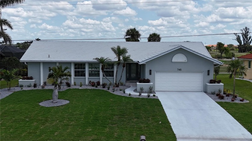 Welcome to this beautifully updated 3-bedroom, 2-bath pool home - Beach Home for sale in Punta Gorda, Florida on Beachhouse.com