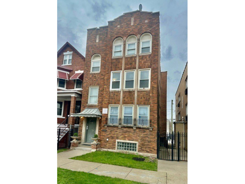 Well maintained Brick legal 3 flat building in the heart of - Beach Home for sale in Chicago, Illinois on Beachhouse.com