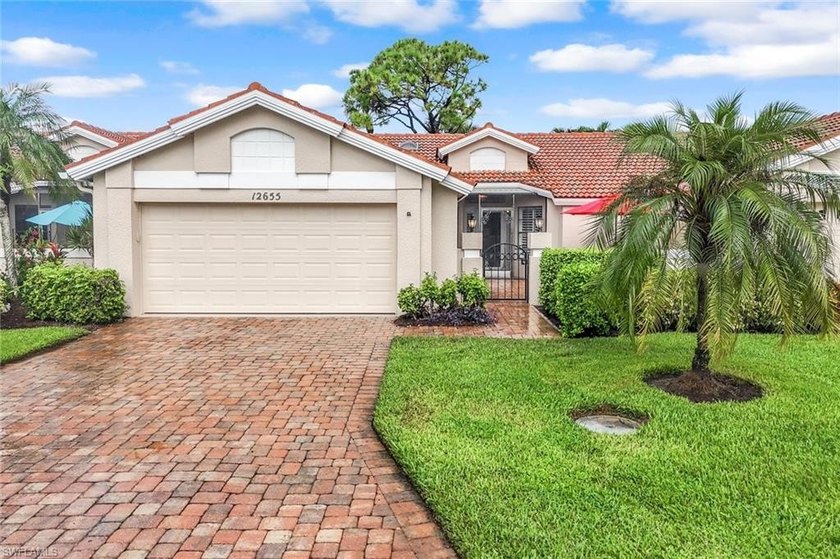 This charming 3 bedroom, 2 bath courtyard villa home is nicely - Beach Home for sale in Bonita Springs, Florida on Beachhouse.com