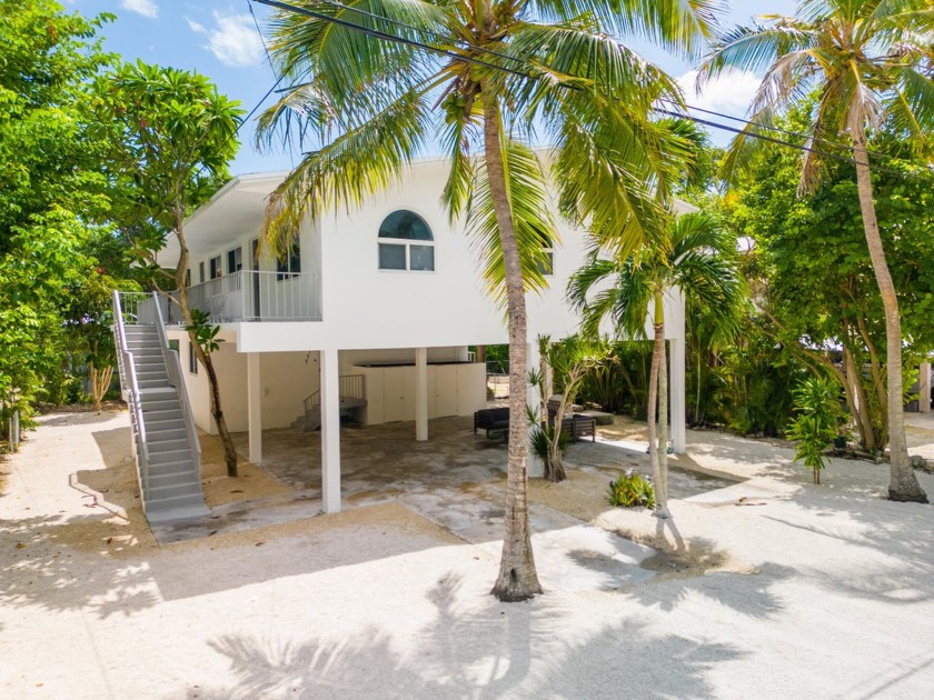 Step inside this stunning remodeled home, offering 5bedrooms & 4 - Beach Home for sale in Key Largo, Florida on Beachhouse.com