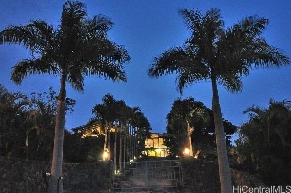 Enter via a gated Palm Tree lined drive to a dramatic custom - Beach Home for sale in Kailua Kona, Hawaii on Beachhouse.com