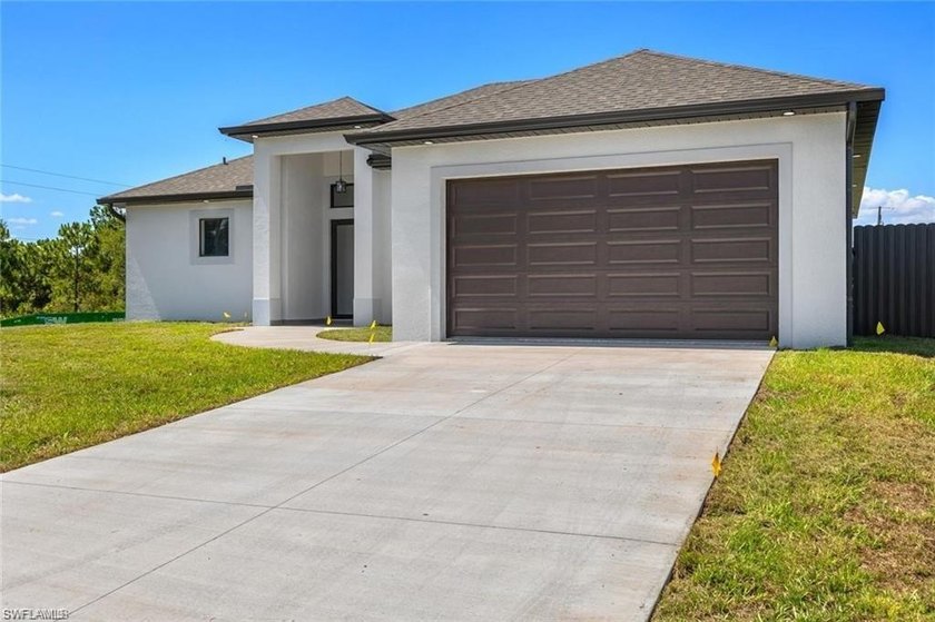 Beautiful CORNER lot new construction home, move-in ready! This - Beach Home for sale in Lehigh Acres, Florida on Beachhouse.com