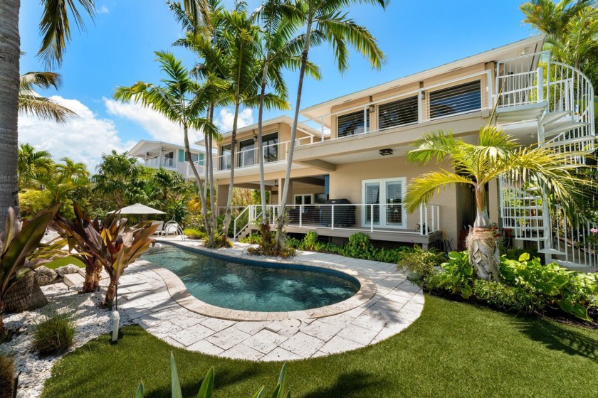 Modern Waterfront Retreat with Rooftop Terrace & Resort-Style - Beach Home for sale in Plantation Key, Florida on Beachhouse.com