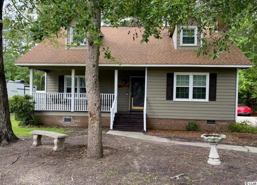 This quaint home is nestled in the small, mature community of - Beach Home for sale in Myrtle Beach, South Carolina on Beachhouse.com