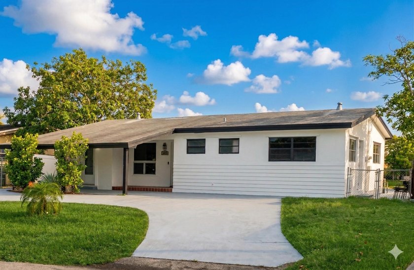 Charming 3-bedroom, 2-bath single-family home situated on a - Beach Home for sale in Hallandale Beach, Florida on Beachhouse.com