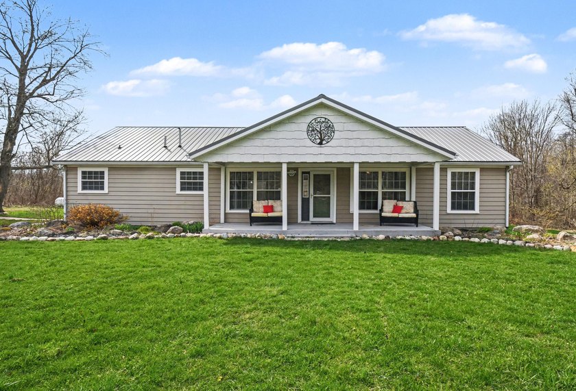 This 3 bed 2 bath ranch style home sits on a serene 20 acres and - Beach Home for sale in Coloma, Michigan on Beachhouse.com
